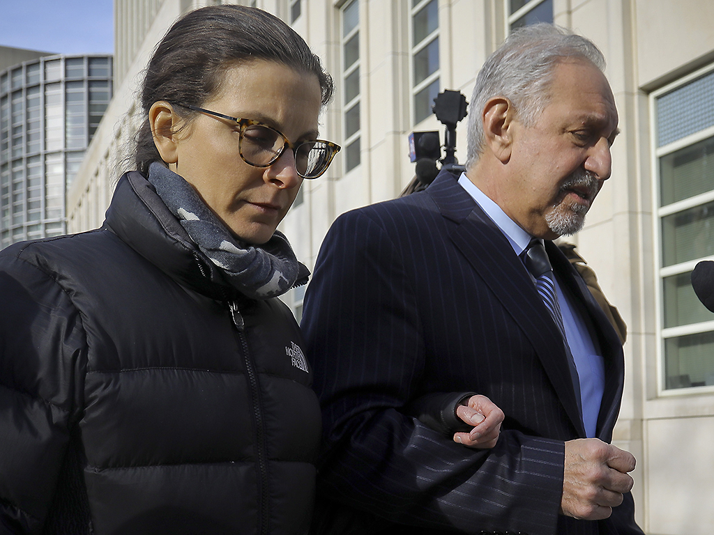 Clare Bronfman, a member of NXIVM, leaves Brooklyn Federal Court with her lawyer Mark Geragos after she received medical attention on Wednesday March 27, 2019, in New York.