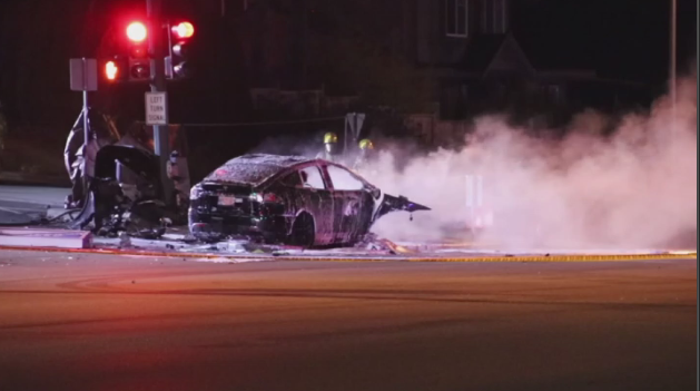 Authorities said  a vehicle slammed into a power pole and burst into flames, killing one person.