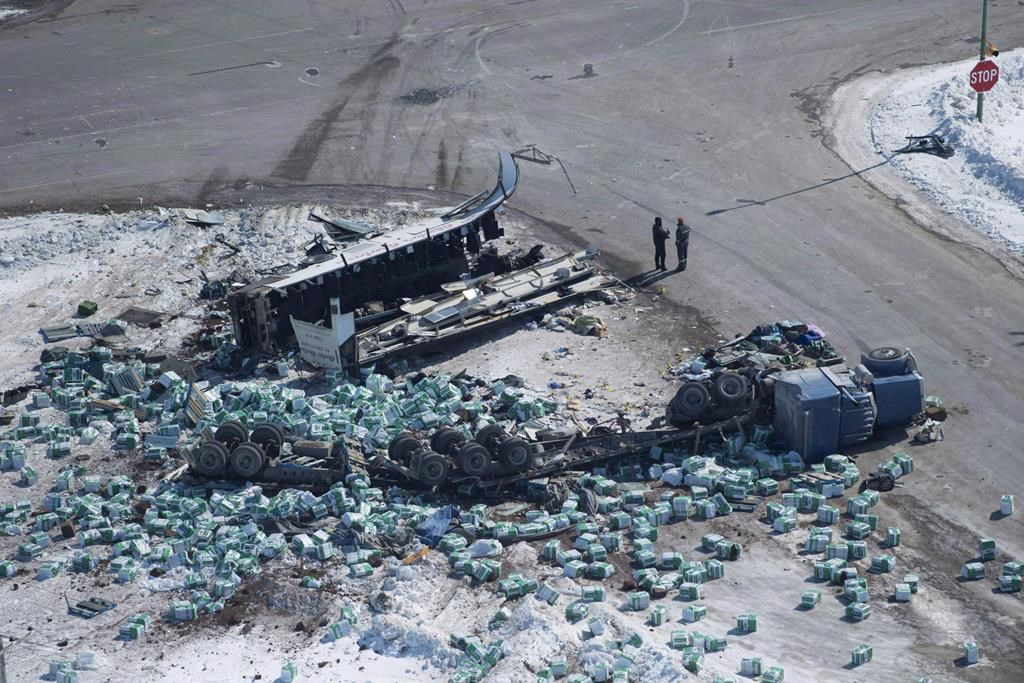 The wreckage of a fatal crash outside of Tisdale, Sask., is seen on Saturday, April, 7, 2018. THE CANADIAN PRESS/Jonathan Hayward