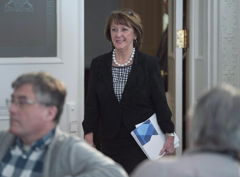Nova Scotia Finance Minister Karen Casey arrives to brief reporters before she tables her budget at the legislature in Halifax on Tuesday, March 20, 2018.