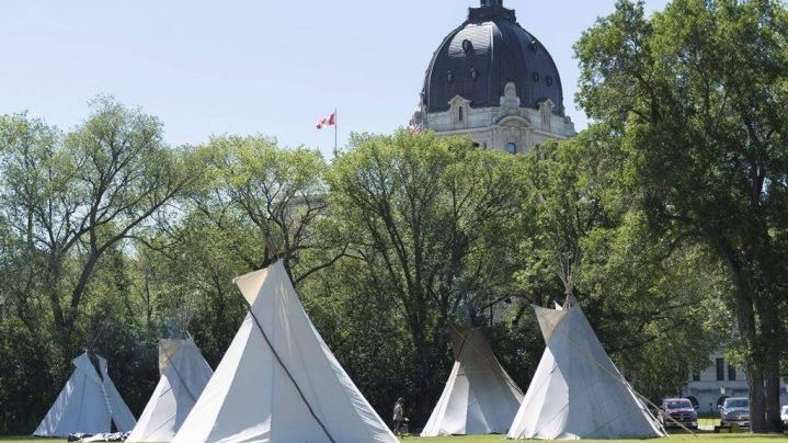 A man accused of setting off fireworks toward a protest camp outside the Saskatchewan legislature last summer has received an absolute discharge.