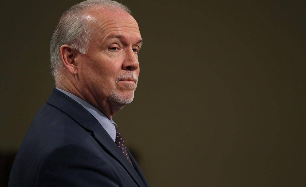 Premier John Horgan speaks during a press conference in the press theatre at Legislature in Victoria, B.C., on Tuesday May 29, 2018.