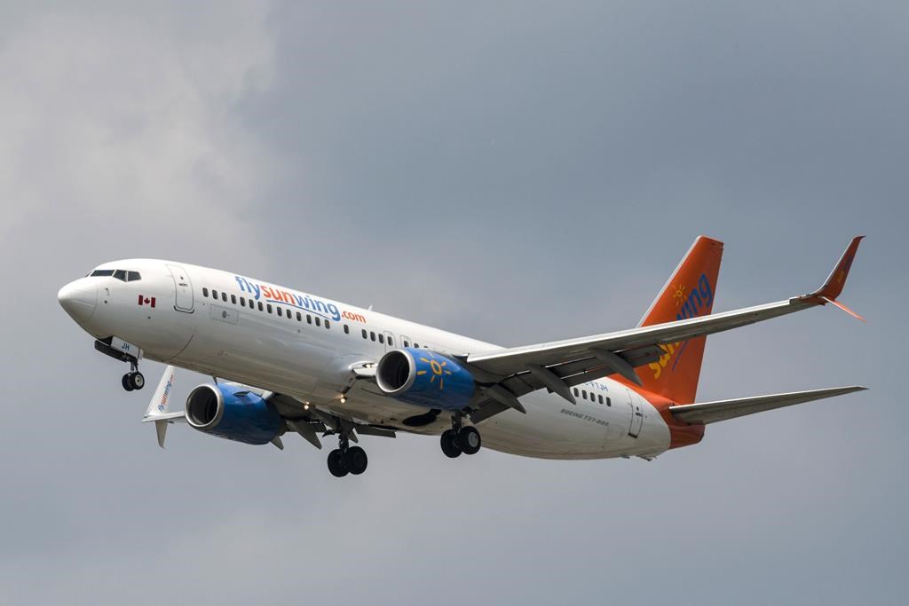 sunwing checked baggage