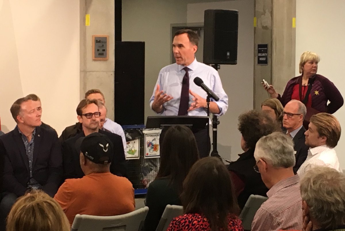 Federal finance minister Bill Morneau answers questions at Kelowna's Okanagan College campus on Tuesday night. 