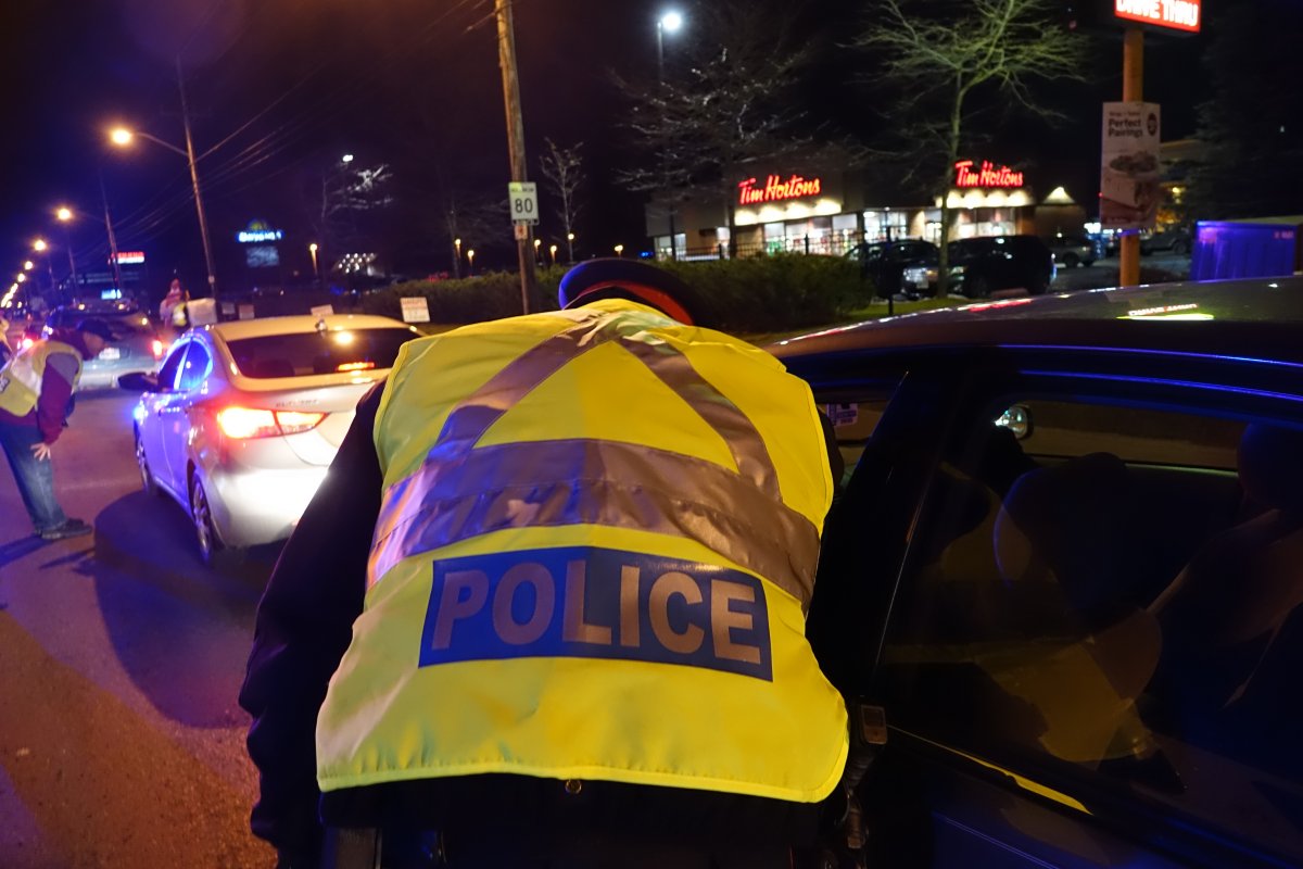 This supplied image shows Ottawa police officers conducting R.I.D.E. checkpoints. The police service holds the roadside sobriety testing program several times a year and will do so over the 2019 St. Patrick's Day weekend.