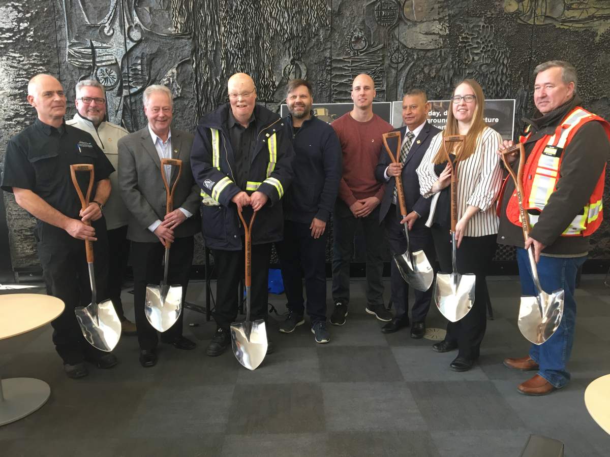 Community members and dignitaries speak at an event marking the 40th anniversary of the Mill Woods explosion.