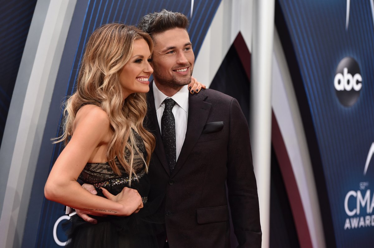 NASHVILLE, TN - NOVEMBER 14:  (FOR EDITORIAL USE ONLY) Singers Carly Pearce and Michael Ray attend the 52nd annual CMA Awards at the Bridgestone Arena on November 14, 2018 in Nashville, Tennessee.  (Photo by John Shearer/WireImage).