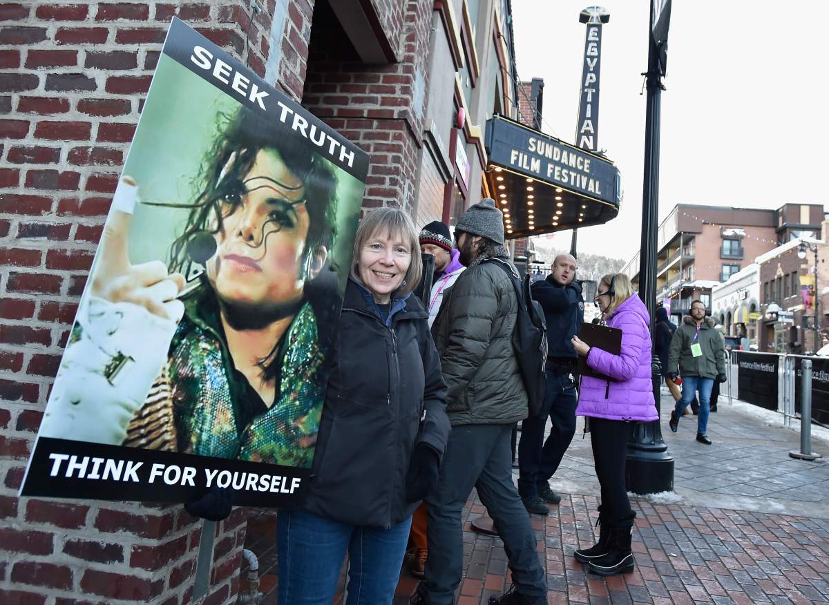 Brenda Jenkyns and Catherine Van Tigem protest the film ‘Leaving Neverland’ screening at the Egeyptian Theatre at the 2019 Sundance Film Festival on Jan. 23, 2019 in Park City, Utah.