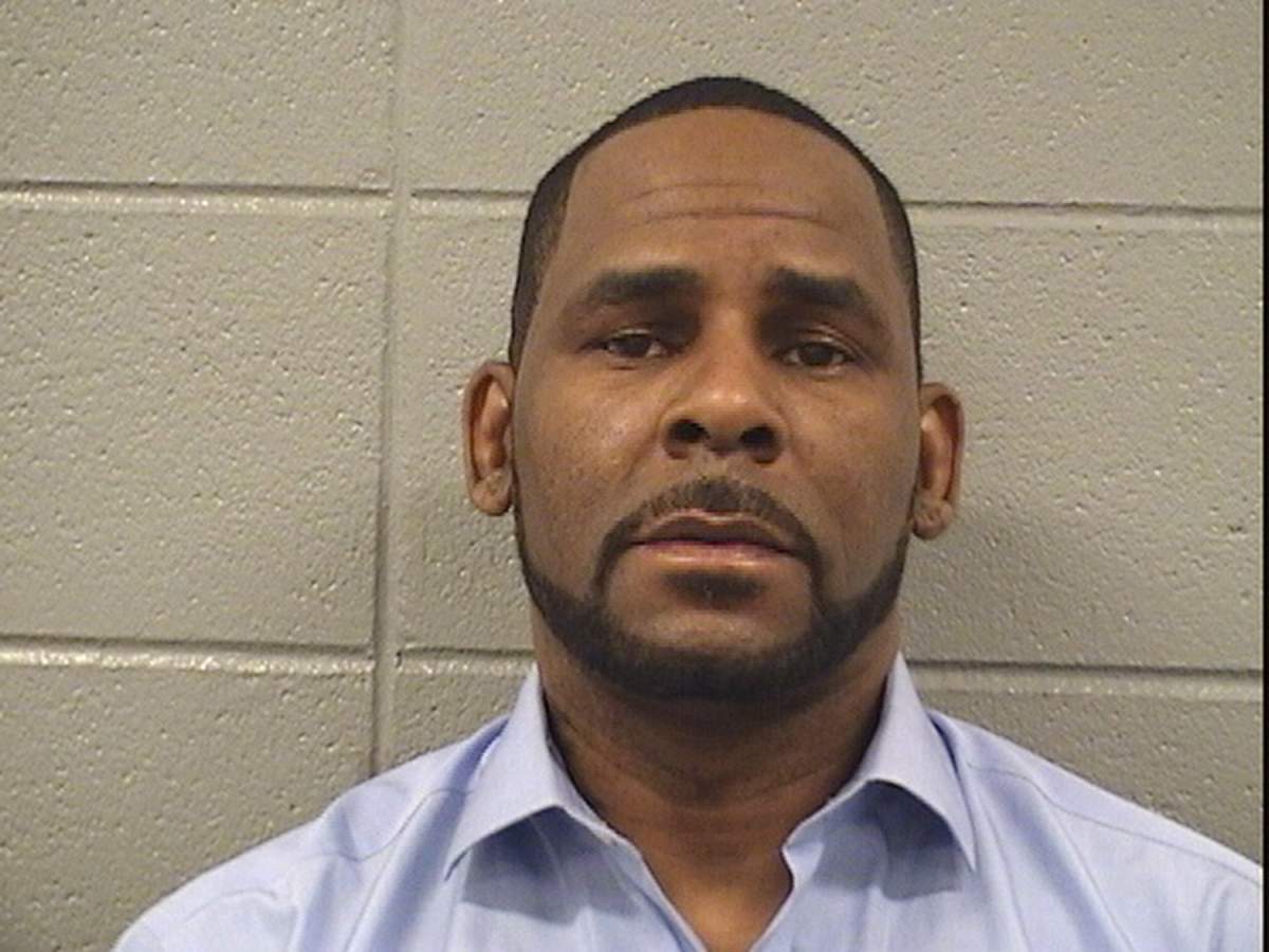 In this handout provided by the Cook County Sheriff’s Office, R. Kelly poses for a mugshot photo after being arrested for $161,663 in unpaid child support on March 6, 2019.