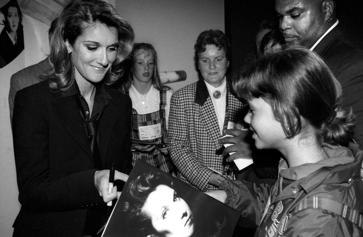Celine Dion meets fans and signs autographs in Rotterdam, Netherlands, on Oct. 18, 1996.