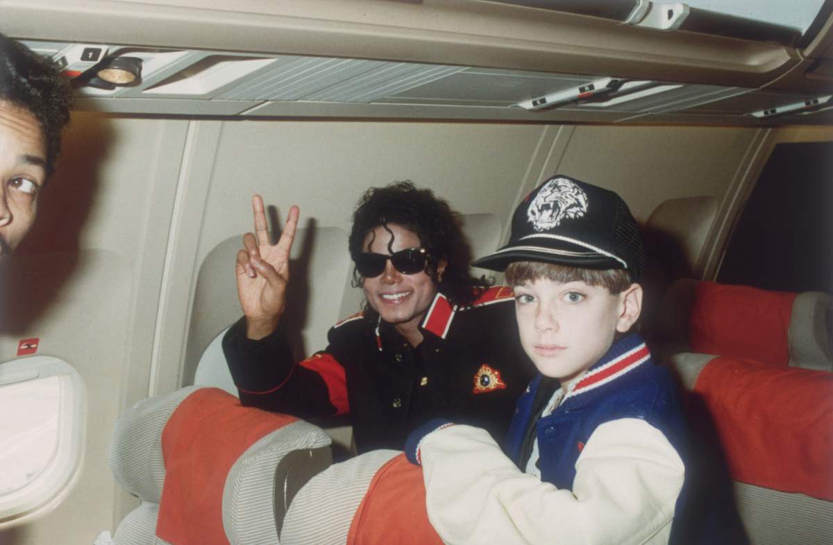 Michael Jackson with 10-year-old James Safechuck on his private tour plane on July 11, 1988.