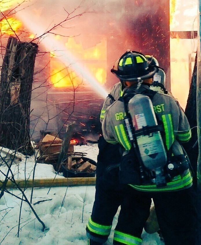 By the time fire crews arrived on scene, the fire had already broken through the roof.