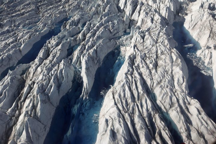  In this July 19, 2011 file photo, pools of melted ice form atop Jakobshavn Glacier, near the edge of the vast Greenland ice sheet.