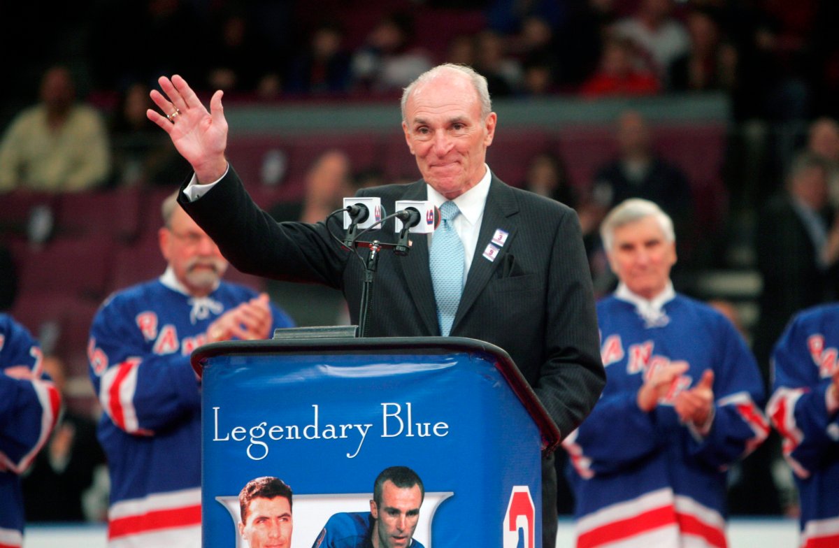 Harry Howell waves to the crowd during a ceremony to retire his number before the Rangers' hockey game at Madison Square Garden in New York on Sunday, Feb. 22, 2009.