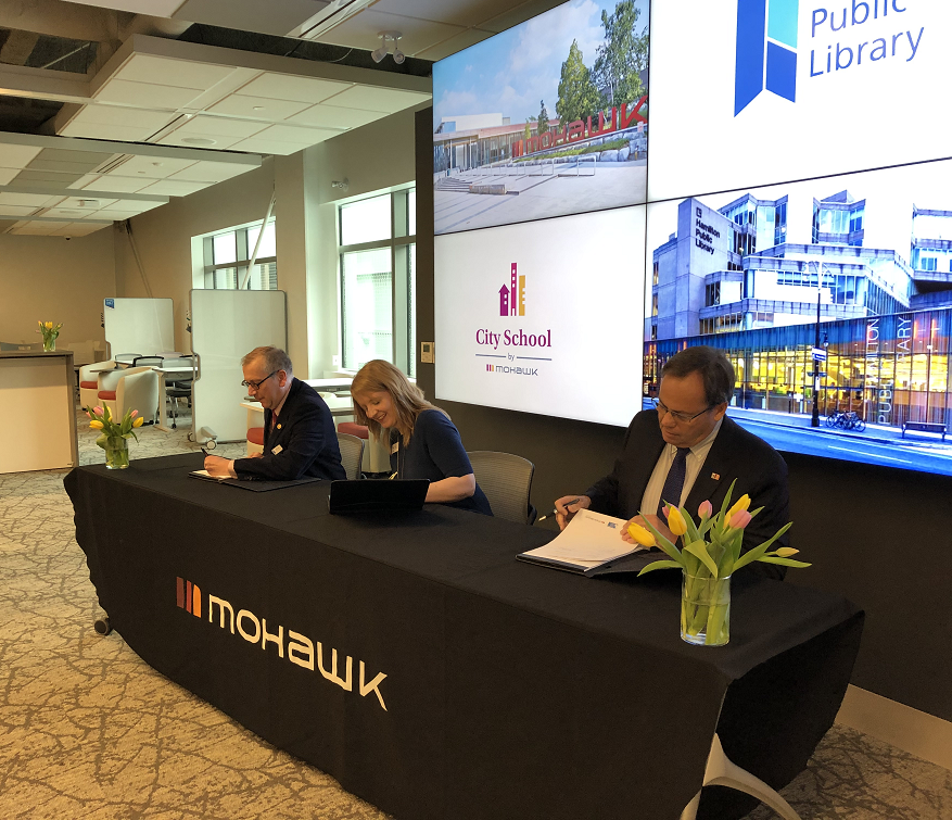 The CEOs of the Hamilton & Burlington Public Libraries and Mohawk College’s President sign a memorandum of understanding on the partnership between the three institutions.