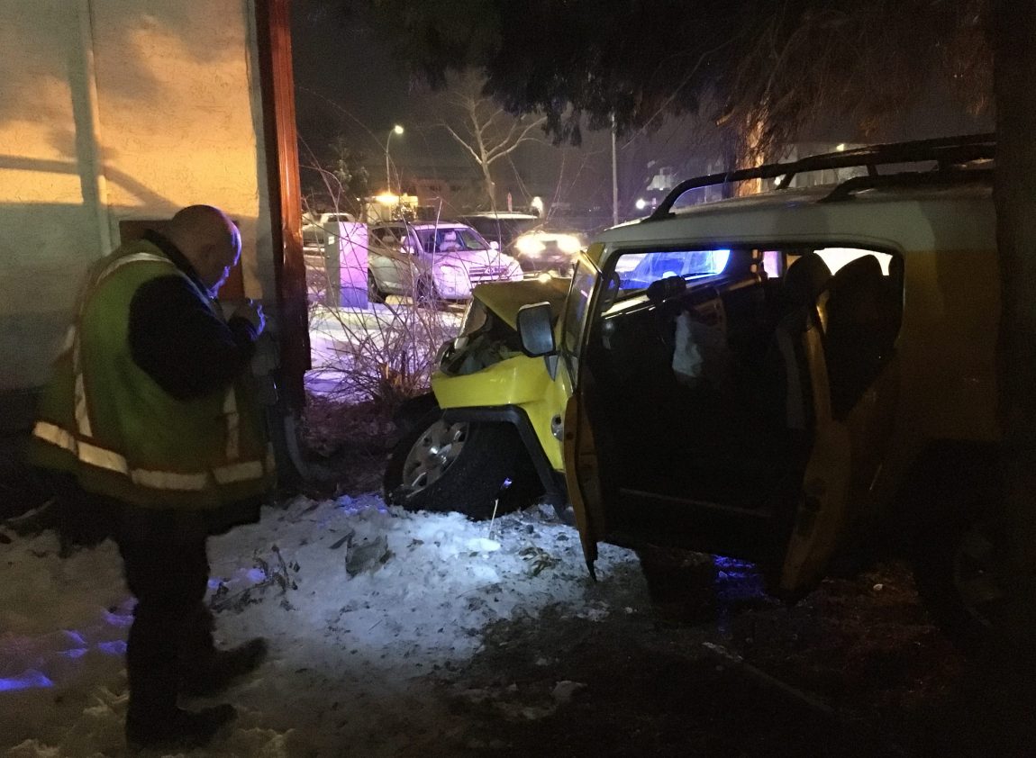 An SUV was heavily damaged after crashing into a Kelowna home on Thursday night. 