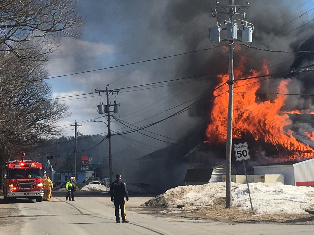 Police officers and multiple fire departments were on scene to battle the blaze in New Minas, N.S., on March 19, 2019. 