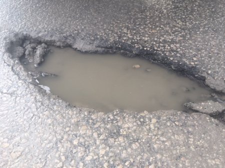 winnipeg hustling crews pothole