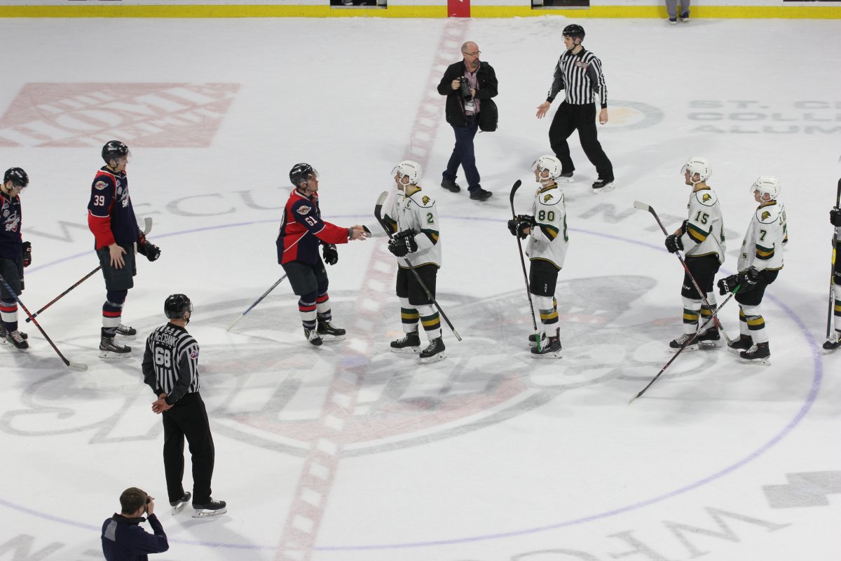 The London Knights and the Windsor Spitfires shake hands at the end of their first-round series. The Knights won 5-2 on March 28, 2019 to sweep their way into Round 2 of the OHL playoffs.