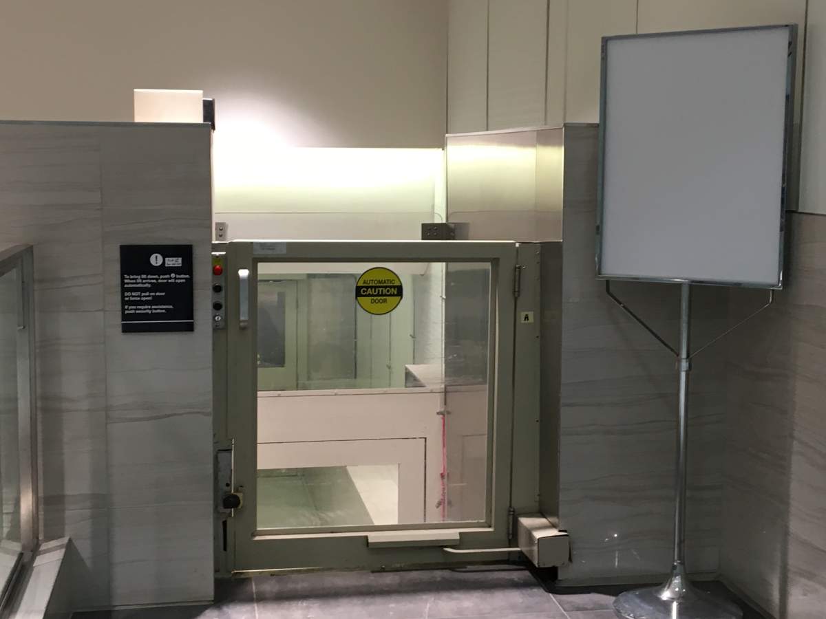 The 'out of order' sign has been removed and the lift is once again operational.