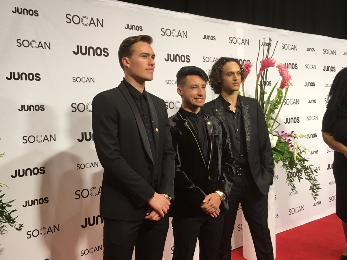 Andrew Fedyk (left) and Joe Depace (middle) of Loud Luxury pose on the red carpet of the Junos Gala Dinner and Awards on Saturday.