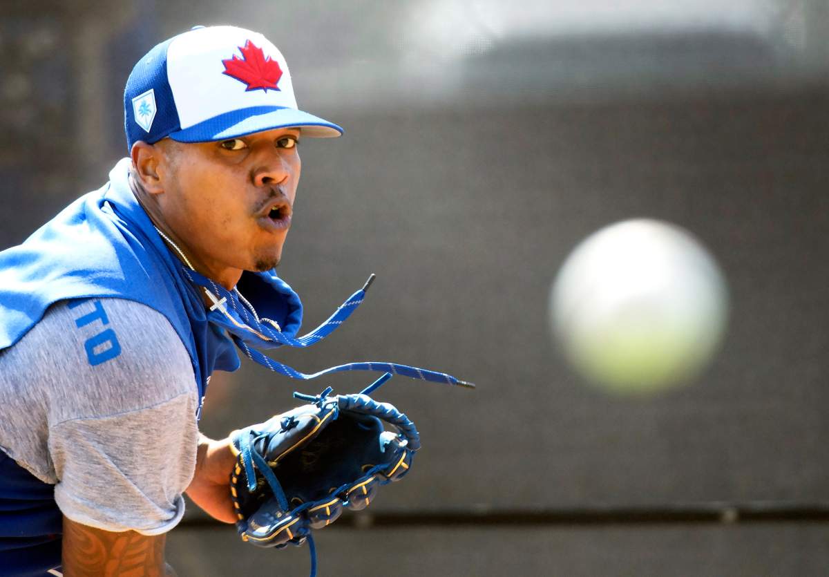 Toronto Blue Jays pitcher Marcus Stroman throws a bullpen session at spring training baseball in Dunedin, Fla.