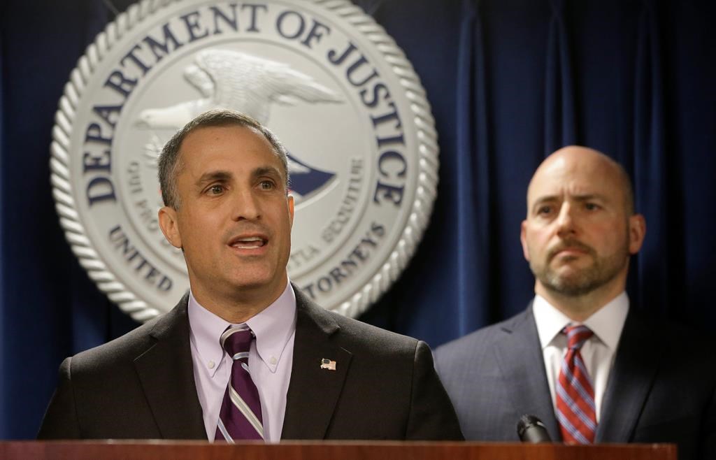 FBI Special Agent in Charge Boston Division Joseph Bonavolonta, left, and U.S. Attorney for District of Massachusetts Andrew Lelling, right, face reporters as they announce indictments in a sweeping college admissions bribery scandal.