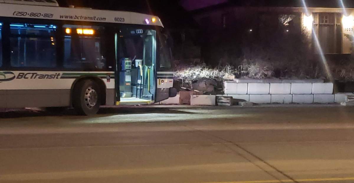 A cement barrier where a bus ran over shows damage on Rutland Road North.