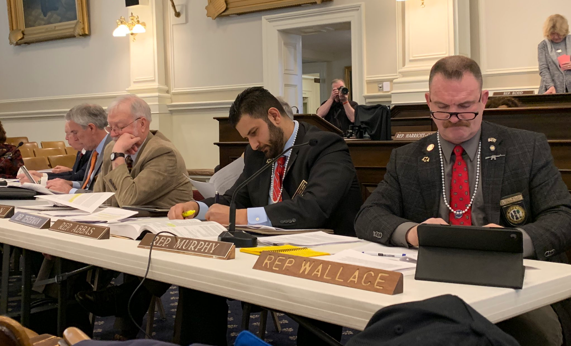 New Hampshire state politicians wear pearls as their committee debates gun control on March 5, 2019.