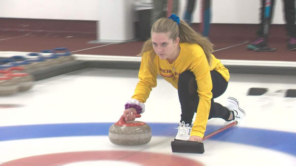 Grade 9 student Atleigh Fuhr hits the ice at the Crestwood Curling Club in Edmonton for practice. She also plays soccer and volleyball and competes in cross-country running for her school.