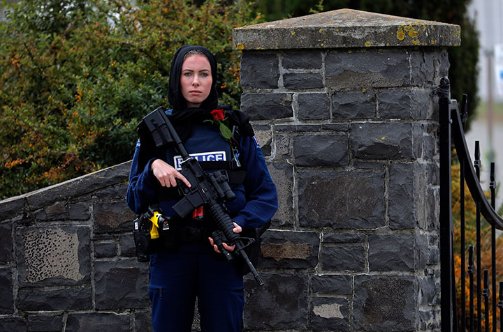 Associated Press photographer Vincent Yu captured this image of Whanganui Police Constable Michelle Evans standing guard outside of the Christchurch Memorial Park Cemetery on March 21, 2019.