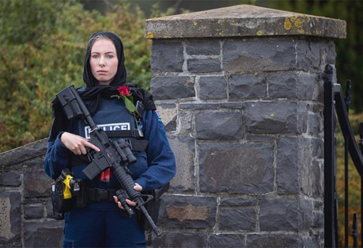 Photographer Alden Williams with New Zealand’s Stuff news outlet captured this image of Whanganui Police Constable Michelle Evans standing guard outside of the Christchurch Memorial Park Cemetery on March 21, 2019. 