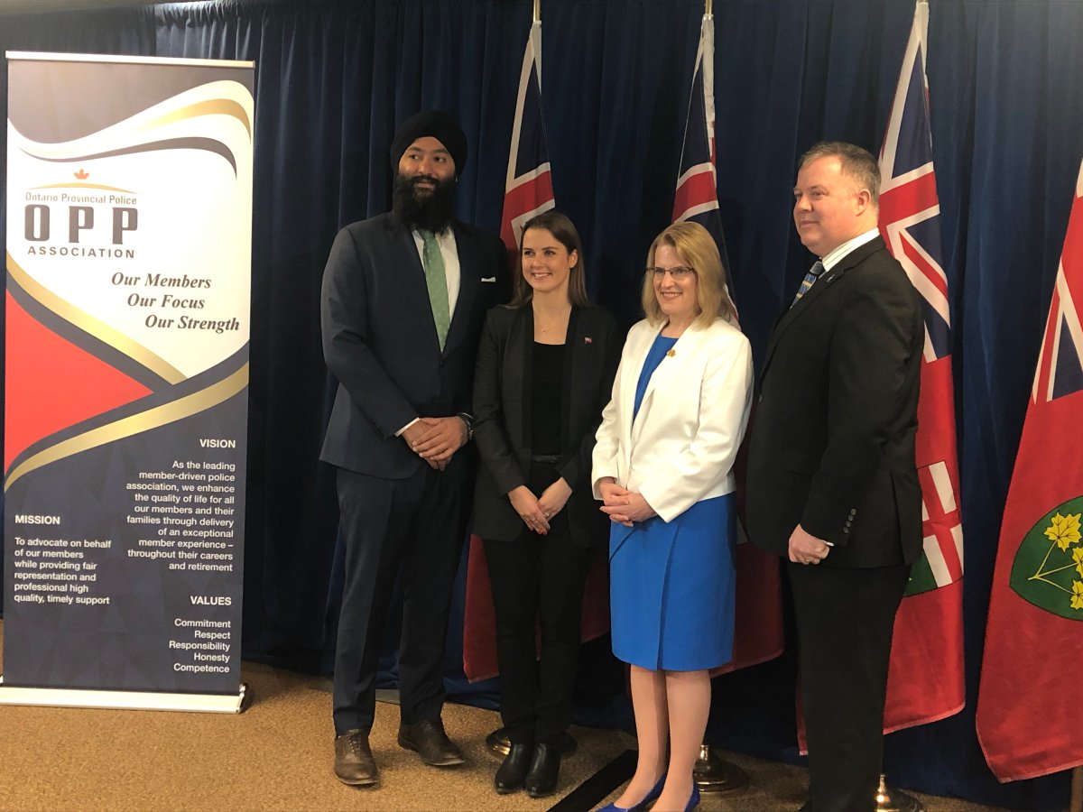 Minister of Community Safety and Correctional Services, Sylvia Jones, (centre) announced the details of a new mental health supports program for OPP officers on Friday, March 29, 2019 in Barrie, Ont. 