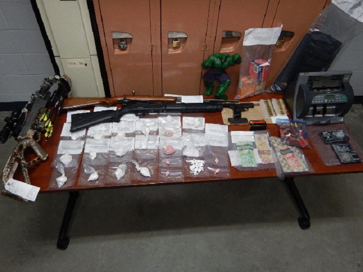 Drugs, guns, ammo, money and a motorbike were seized by Penticton RCMP in a drug bust on Thursday.