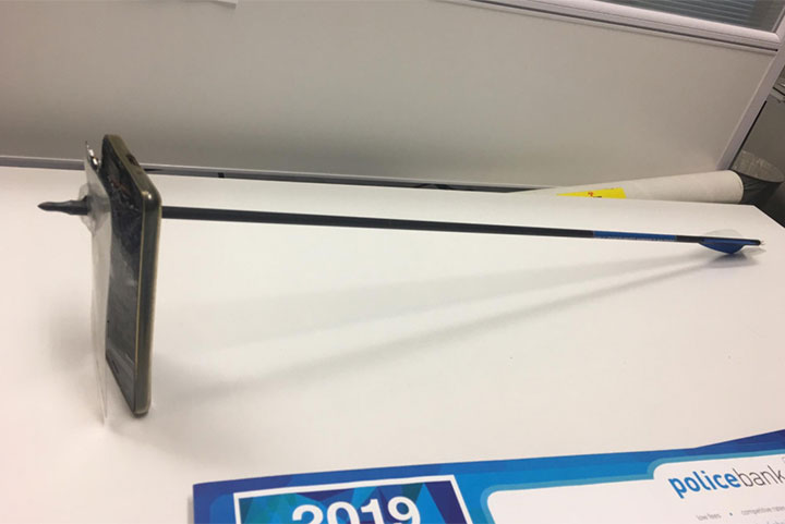 Australian man charged after allegedly firing a bow and arrow at another man. 