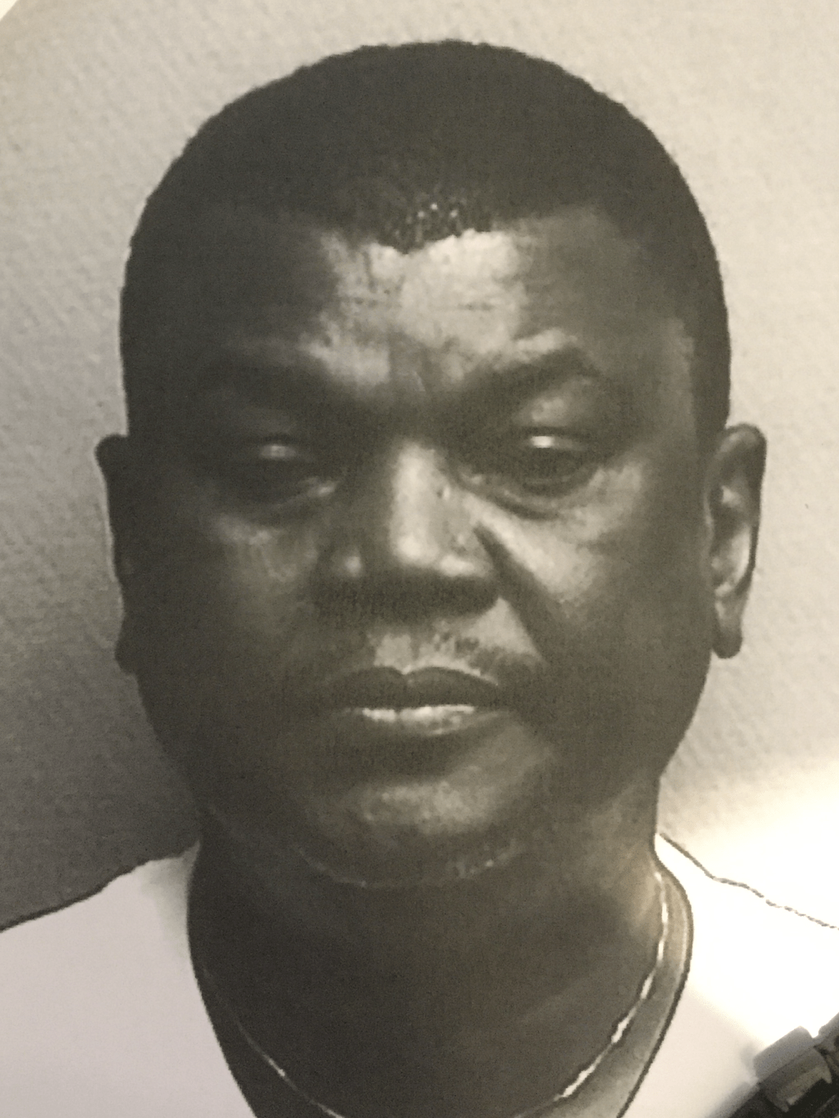 A mug shot from documents submitted as part of the arrest request for Adesanya Prince, who walked into Canada from the U.S. at Roxham Road.