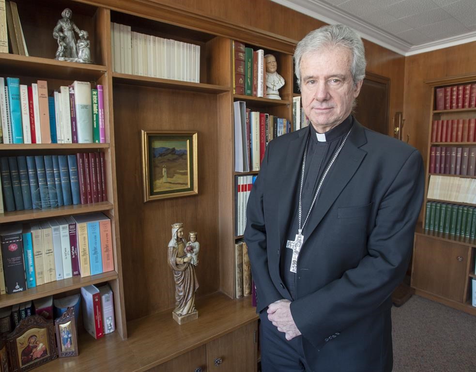 Archbishop Christian Lepine is seen in his office.