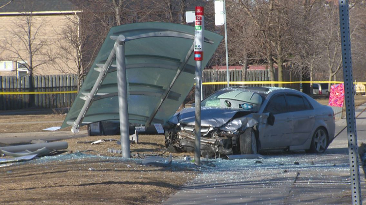 One of the vehicles involved in the collision crashed into a bus shelter.