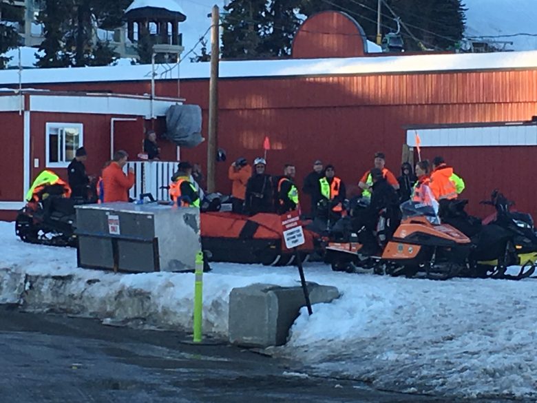 Vernon Search and Rescue await word before entering the avalanche zone at SilverStar Mountain Resort on Wednesday.