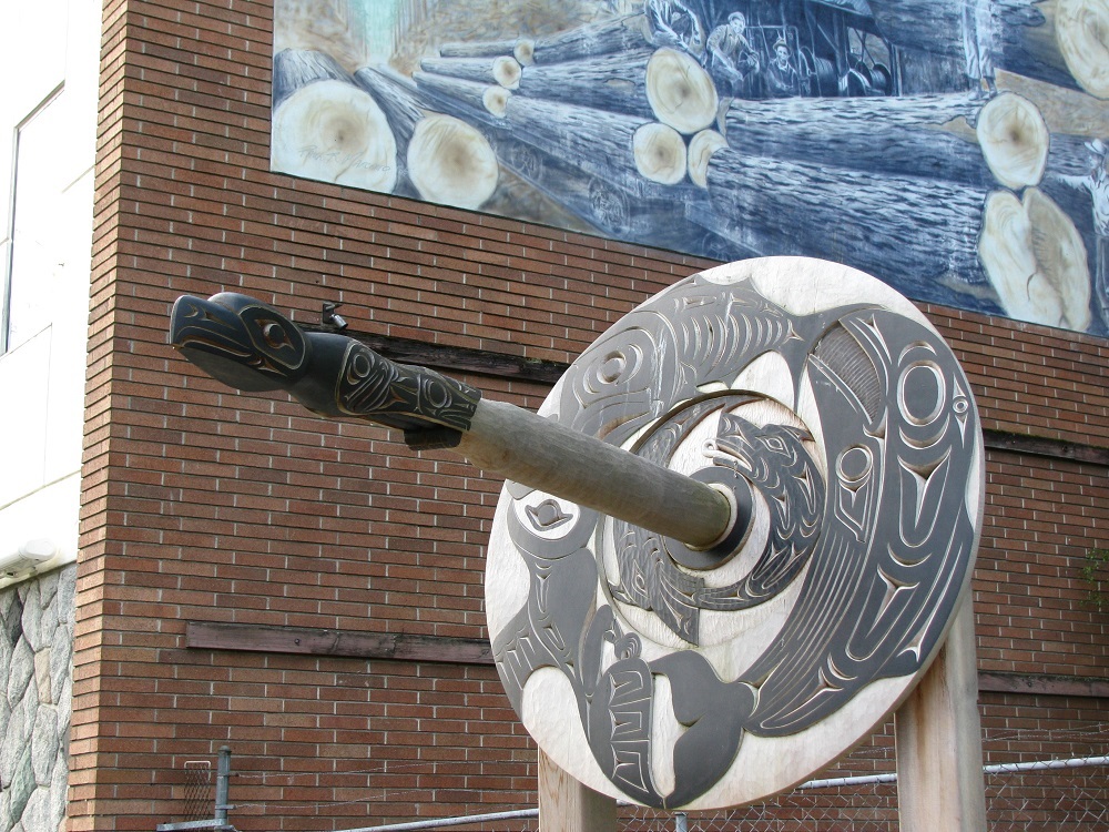 The piece, titled 'Spindle Whorl,' consists of an intricately carved cedar disc nearly one metre in diameter.