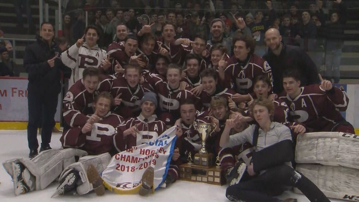 The St. Paul's Crusaders celebrate their fourth consecutive provincial championship in high school hockey.