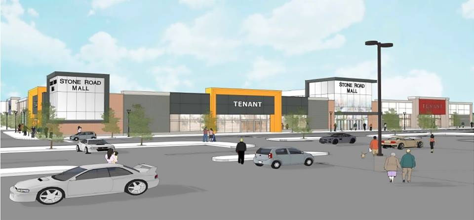 Stone Road Mall says it is redeveloping the former Sears location to accommodate three retailers .