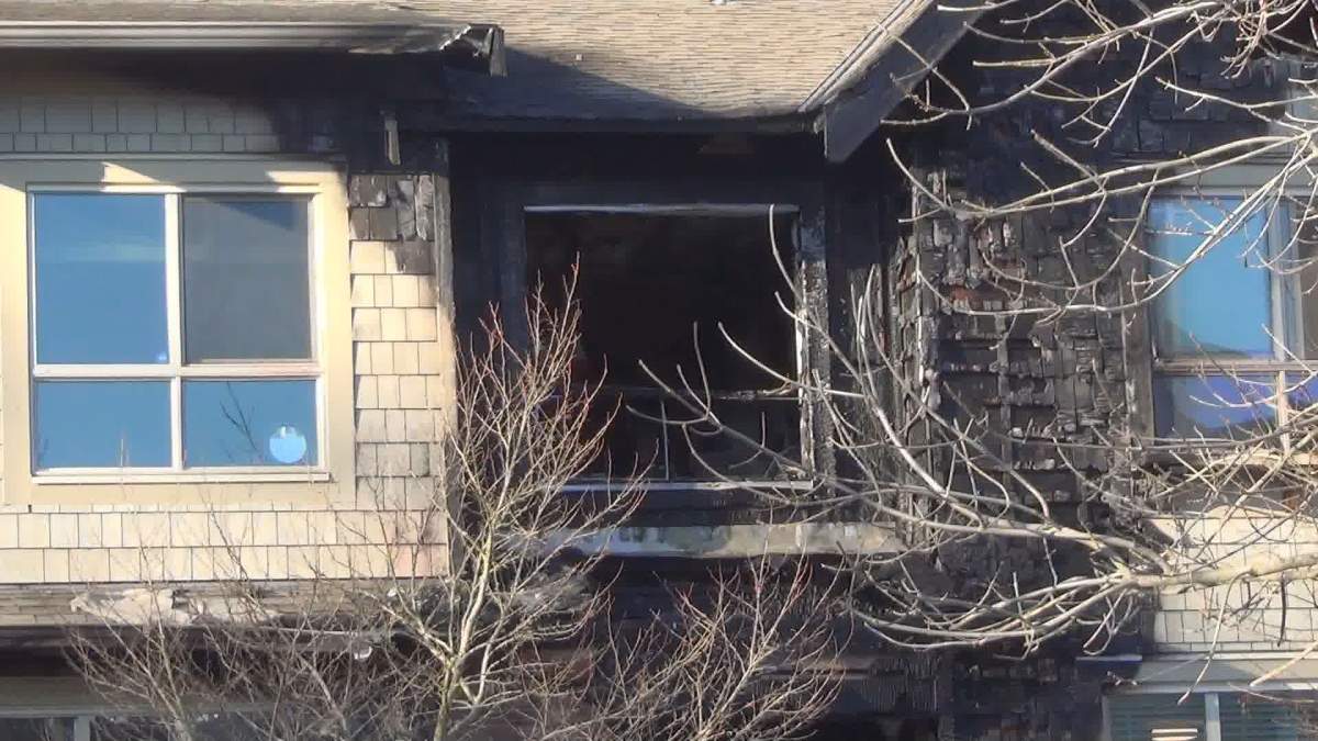 A man suffered second degree burns and two other people were taken to hospital for smoke inhalation from this fire in Surrey on Monday. 