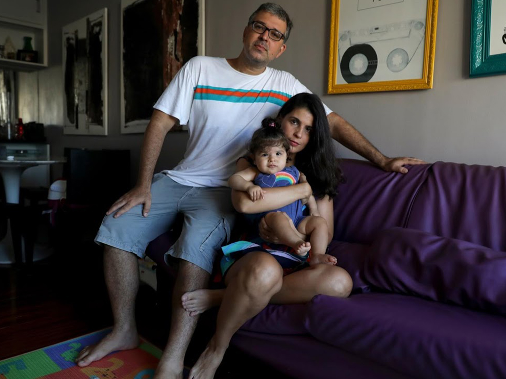 Barcellos, her eight-month-old daughter Alice, and her husband Marcelo Valenca, 39, a teacher at a navy school, on the day Tatiana went back to work. The statutory leave for mothers who work in the public sector in Brazil is 120 to 180 days.