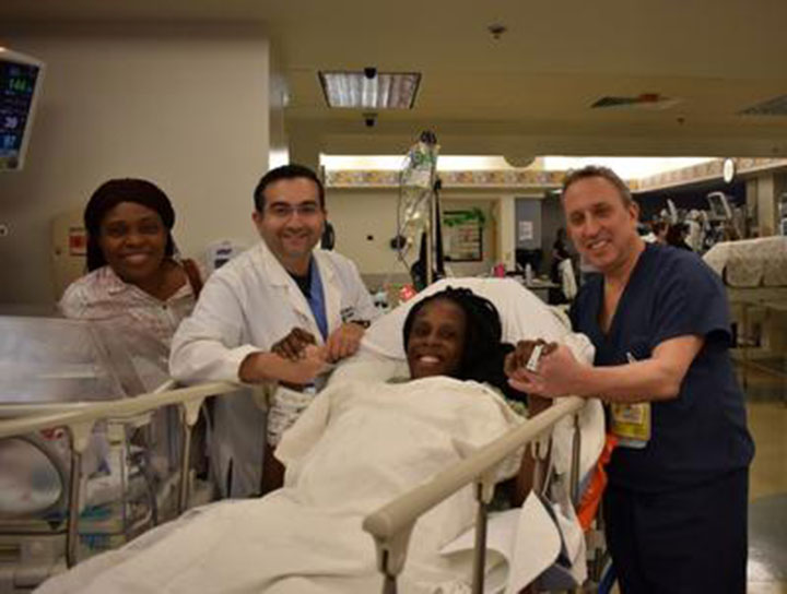 Thelma Chiaka with (l. to r.) relative Ebere Ofor, Dr. Ziad Haidar-Perinatologist who delivered the babies and Dr. Israel Simchowit-Neonatologist , both on staff at The Woman’s Hospital of Texas.