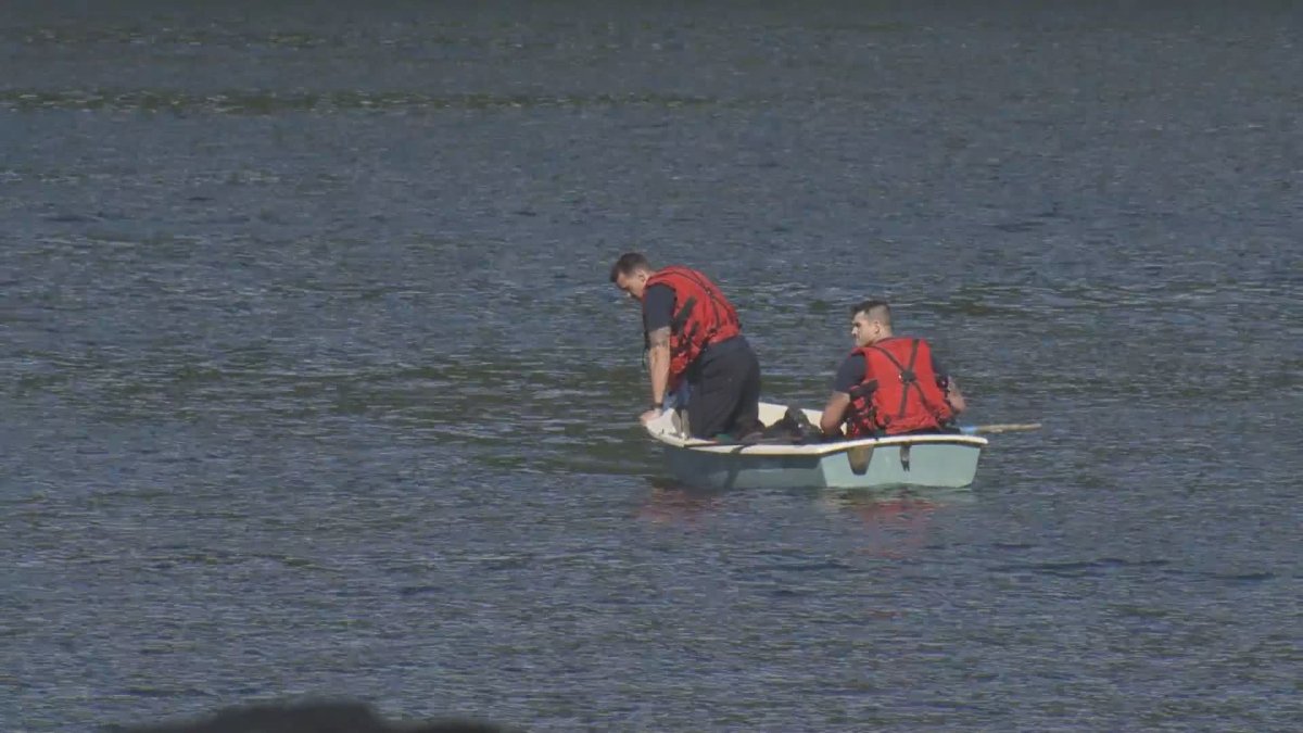 Canadian Coast Guard officers on the water off Barnet Marine Park in Burnaby, where a man fatally drowned Thursday.