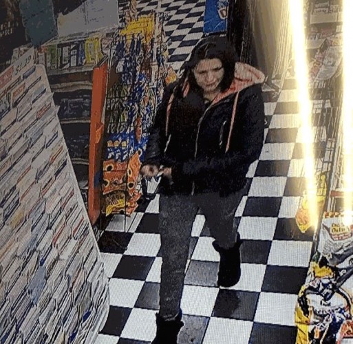 Hamilton police are looking for the woman in this surveillance photo as they try to find a missing man.