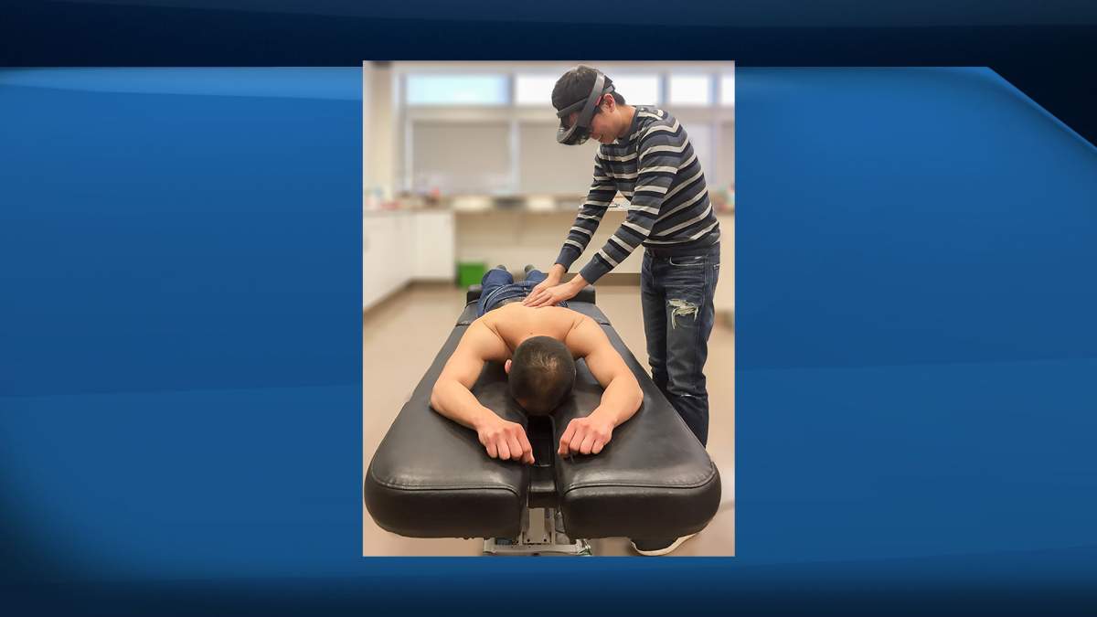 A University of Alberta team has come up with a way to combine medical imaging with virtual reality to help clinicians locate and understand what's happening inside their patients' bodies as they treat them. A demonstration of the virtual reality goggles is seen in an undated handout photo.