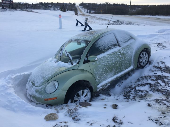 A car in the ditch near Springbank Road and Horizon View Road on Sunday, April 28, 2019 after a spring storm walloped Calgary.