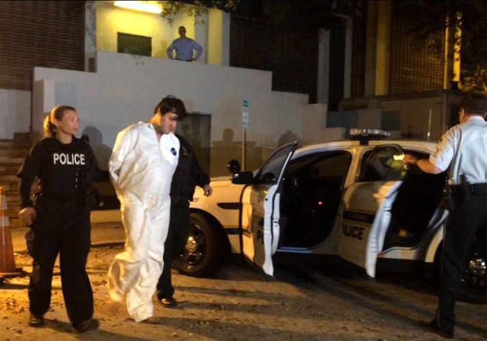 St. Petersburg Police officers take John Nicholas Jonchuck from police headquarters downtown to the Pinellas County Jail, Fla., on Thursday, Jan 8, 2015. Jonchuck, 25, drove toward a bridge over Tampa Bay pulled his car over early Thursday, took his 5-year-old daughter from the back seat, pressed her head to his chest, and tossed her over the rail, according to police in St. Petersburg.